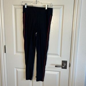 Terez leggings with red piping down sides. Never worn.